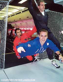 Lindholm experiences 22 seconds of weightlessness after finishing zero-gravity parabolic flight experiments to study pulmonary physiology.